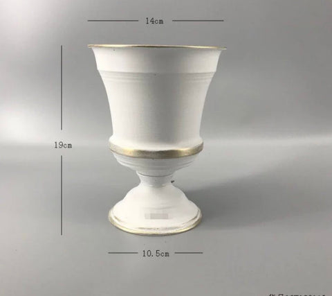 8” high White urn METAL with gold trim