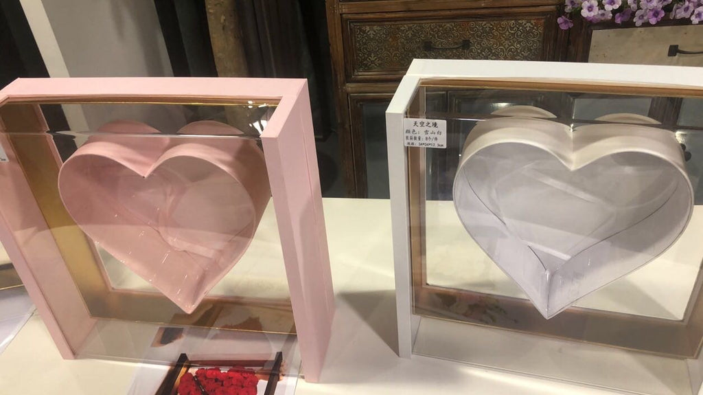 Pink acrylic cardboard box with heart inside